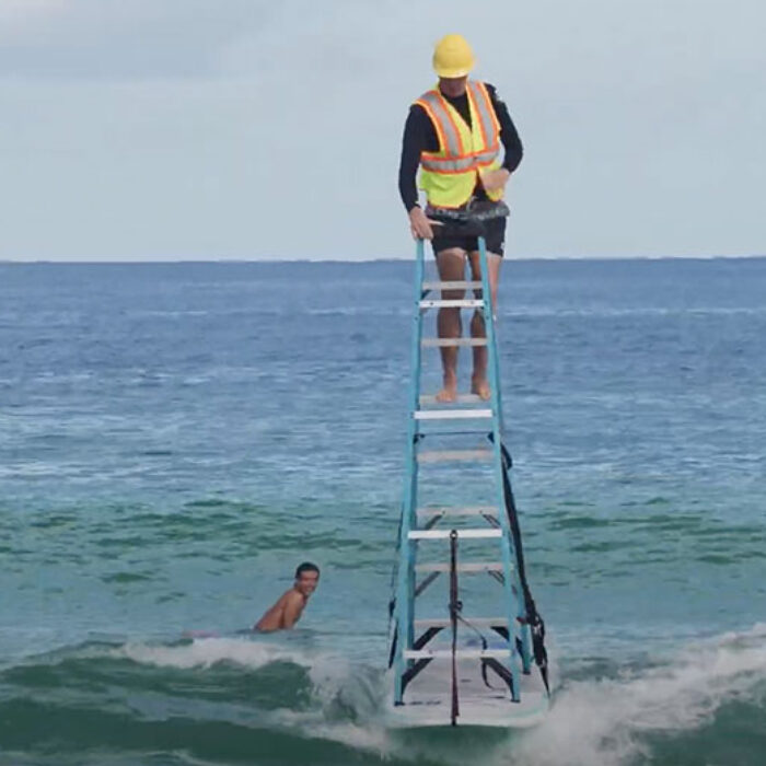 Jamie O'Brien ladder surfing