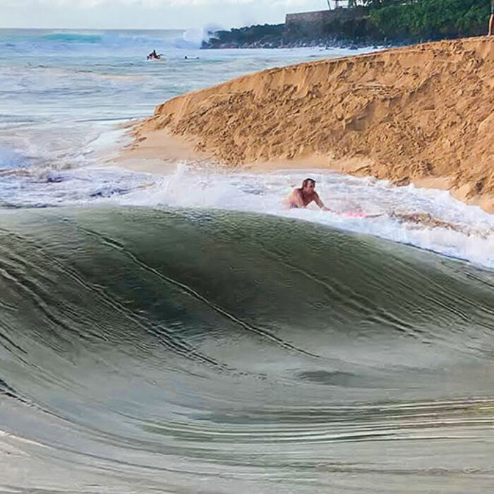 Jamie O'Brien surfing Waimea River