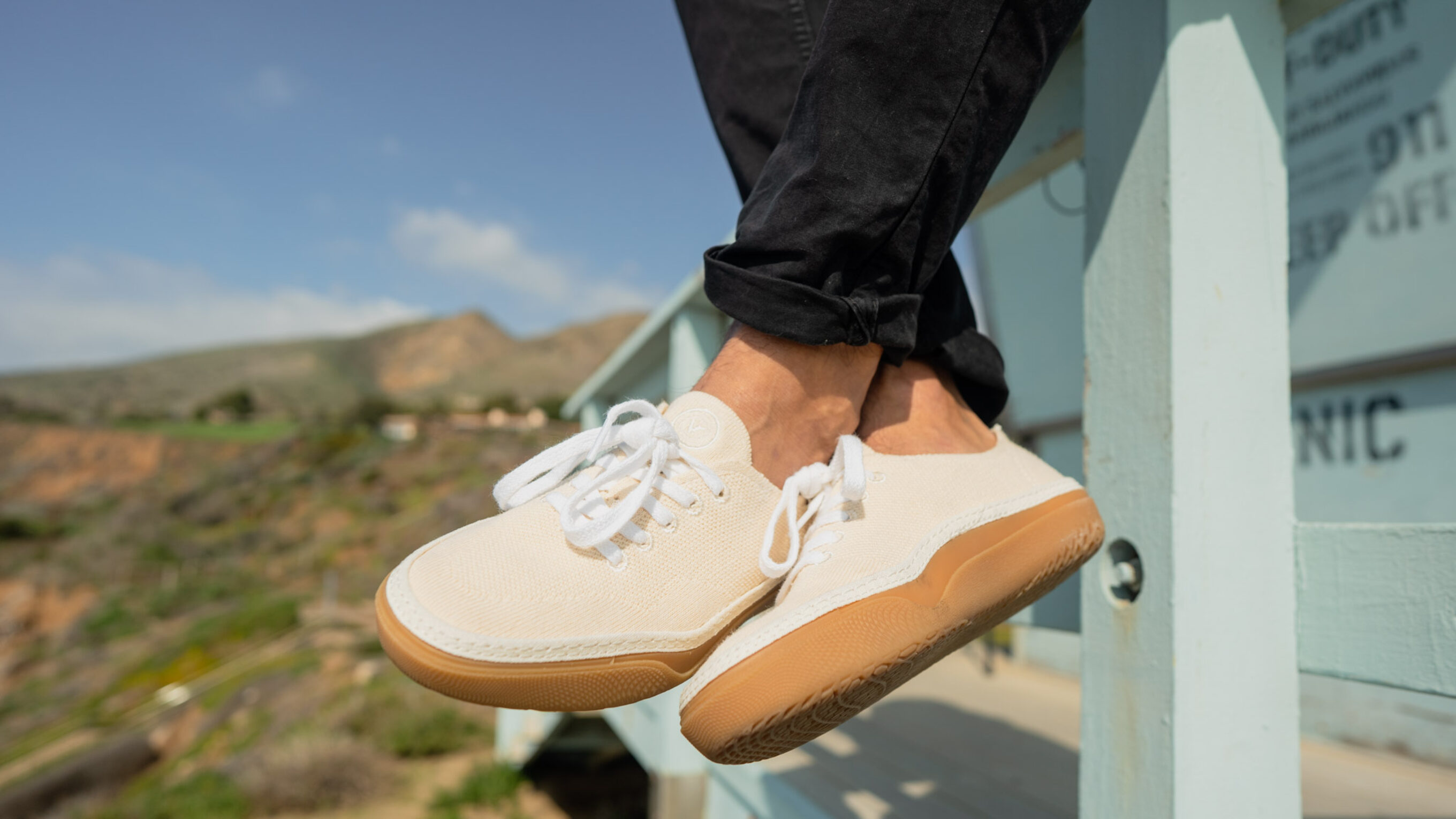 Vans Circle Vee Shoes at Lifeguard Tower on Beach Vans Circle Vee Shoes at Lifeguard Tower on Beach
