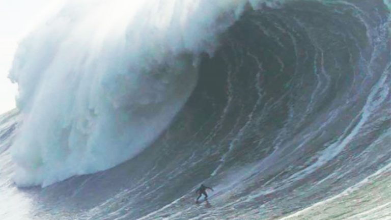 Mason Barnes surfing Nazaré wave