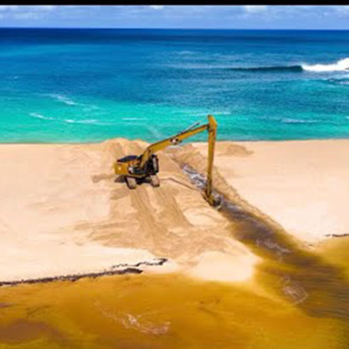 excavator at Waimea Bay