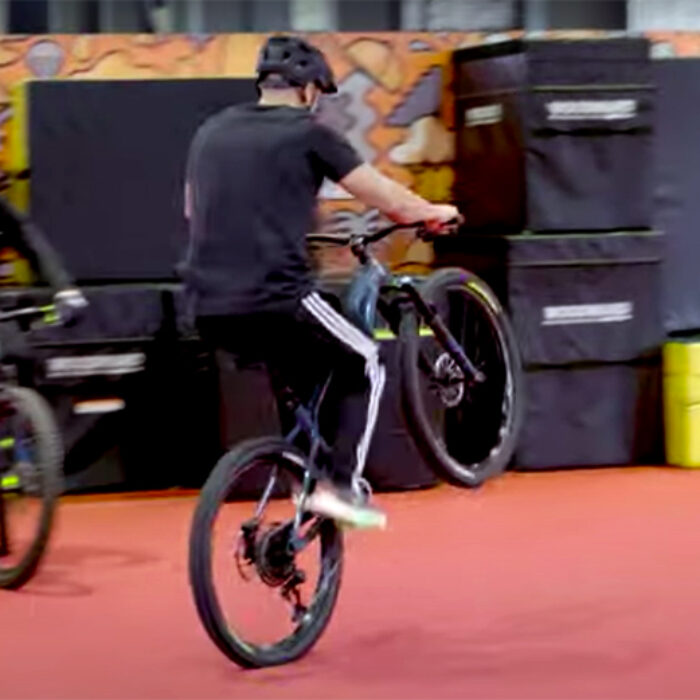 Danny MacAskill Teaches NFL Running Back Austin Ekeler How to Ride a Wheelie