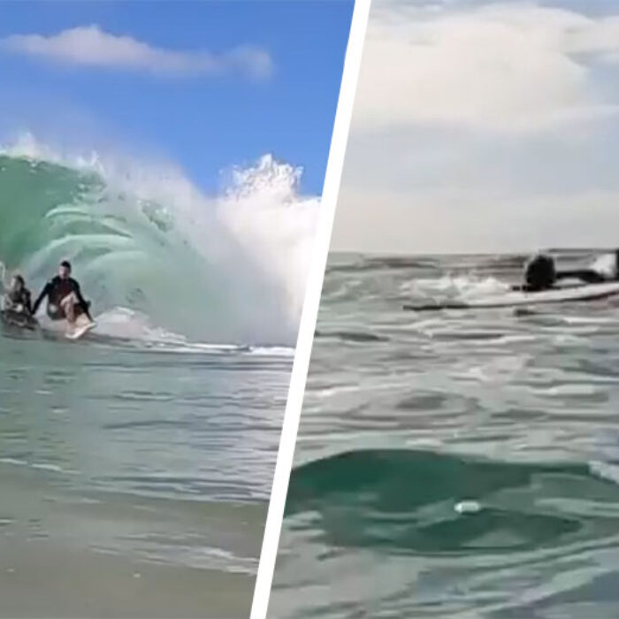 surfer punching boogie boarder