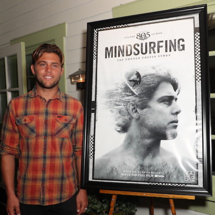 Conner Coffin poses with a poster for 'Mind Surfing'