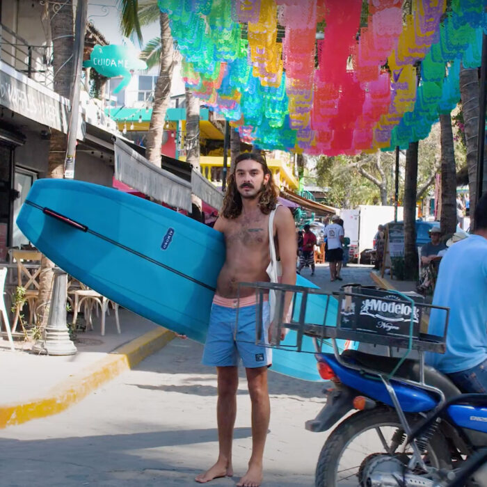 Andy Nieblas surfing
