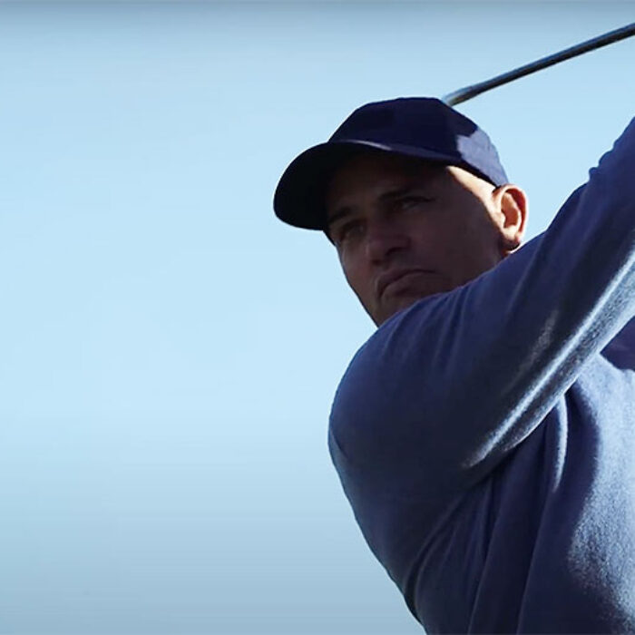 Kelly Slater playing golf