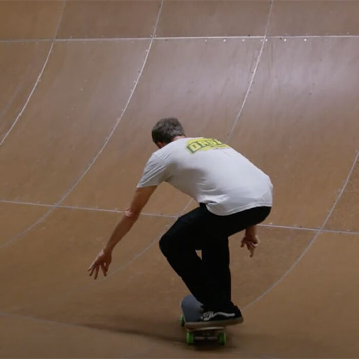 Tony Hawk doing a kick flip