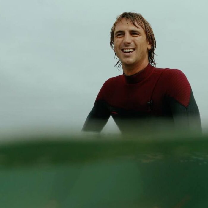 Ian Crane Surfer in Water at San Clemente Pier