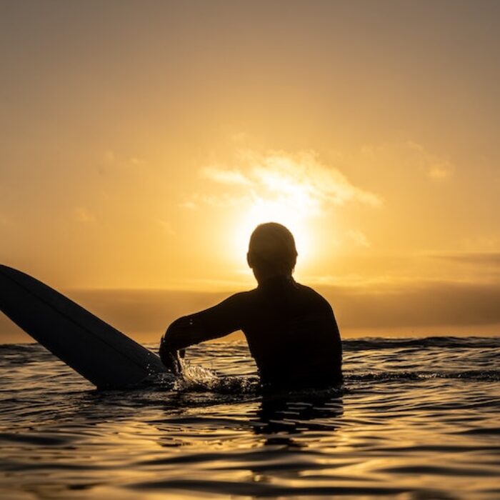 Surfer at sunset