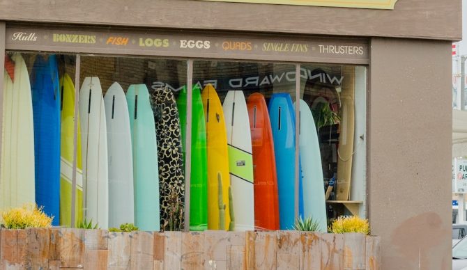 surf shop window of surfboards