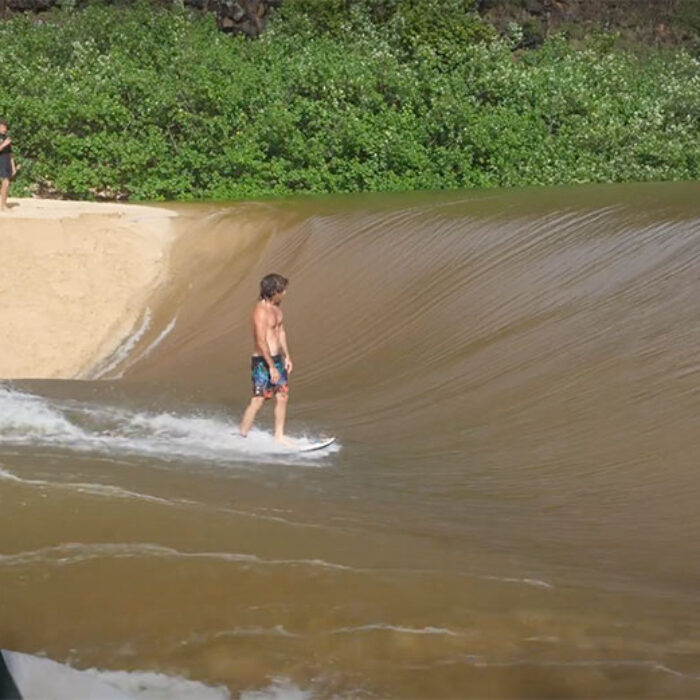 Mason Ho surfing Waimea River wave