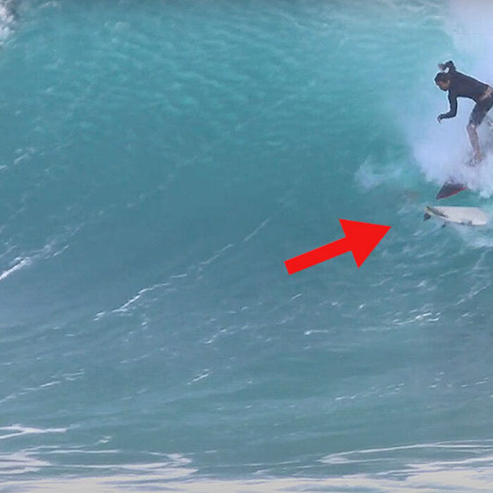 surfer poo-shoots surfboard at Kirra
