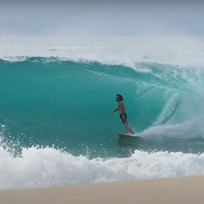 Mason Ho surfing in Hawaii