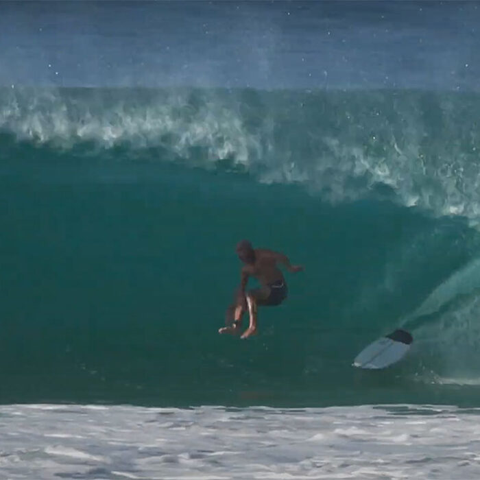 Kelly Slater surfing north shore tubes