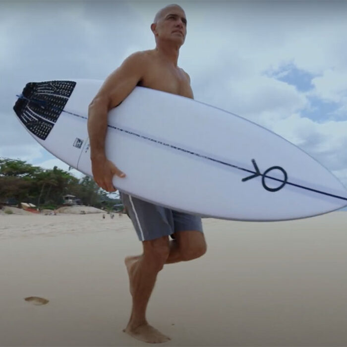 Kelly Slater with surfboard