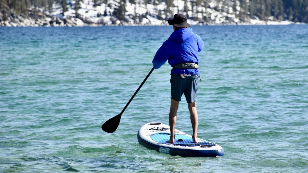 paddling the roc kahuna inflatable paddle board on lake tahoe