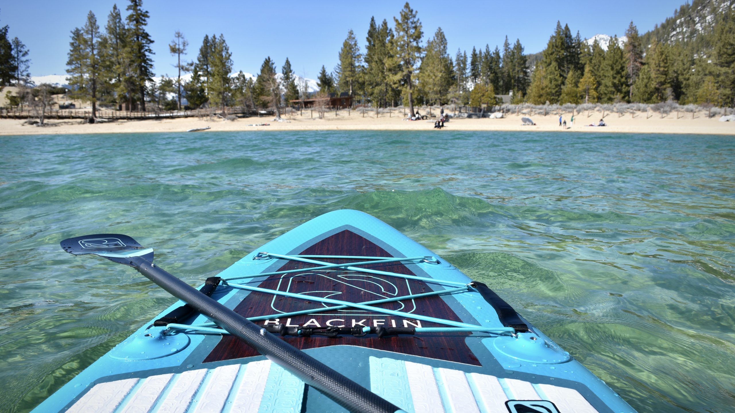 looking at the nose of the blackfin cx ultra inflatable paddle board back towards shore on lake tahoe
