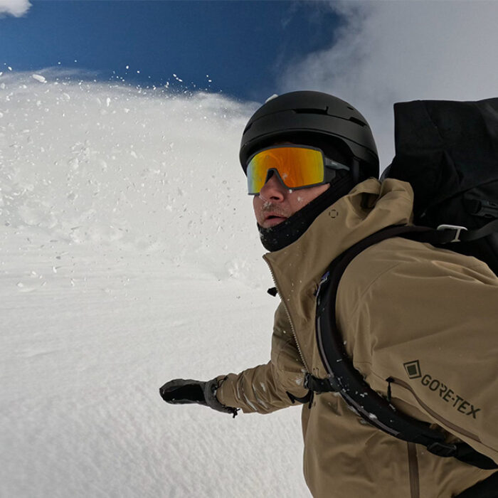 snowboarding in powder with smith pursuit backcountry glasses