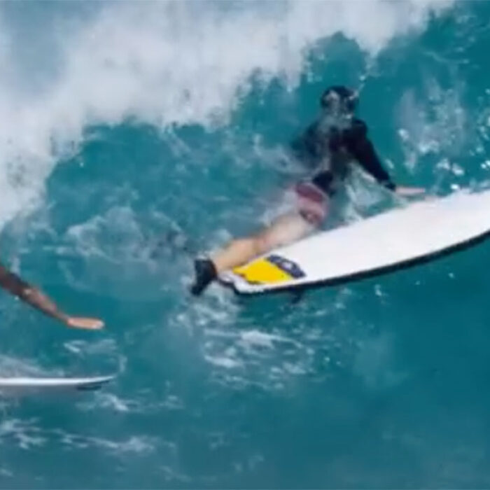 Italo Ferreira dodges surfboard