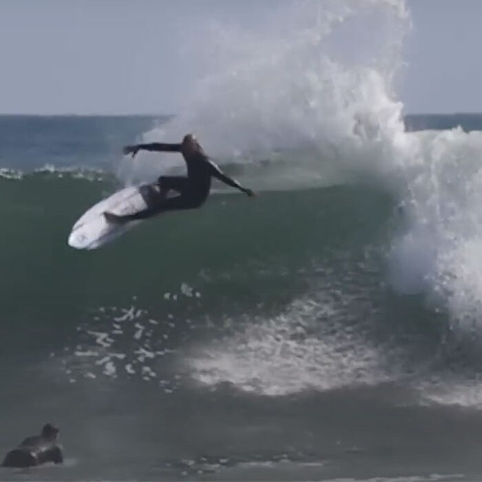 Kelly Slater surfing Lowers
