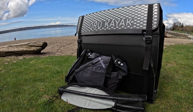 The Beach LT Sport by Oru Kayak, folded up in carry mode on the beach