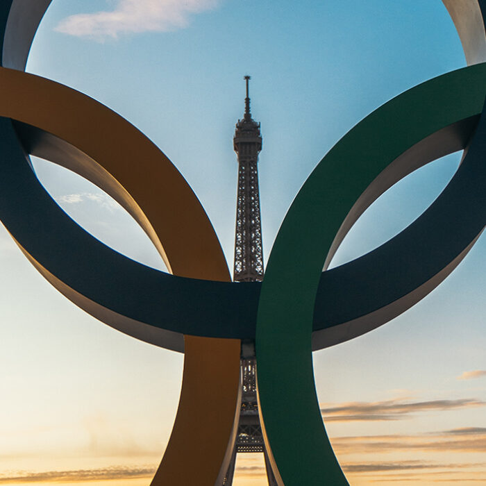 The Olympic Rings and Eiffel tower Photo: Luca Dugaro // Unsplash