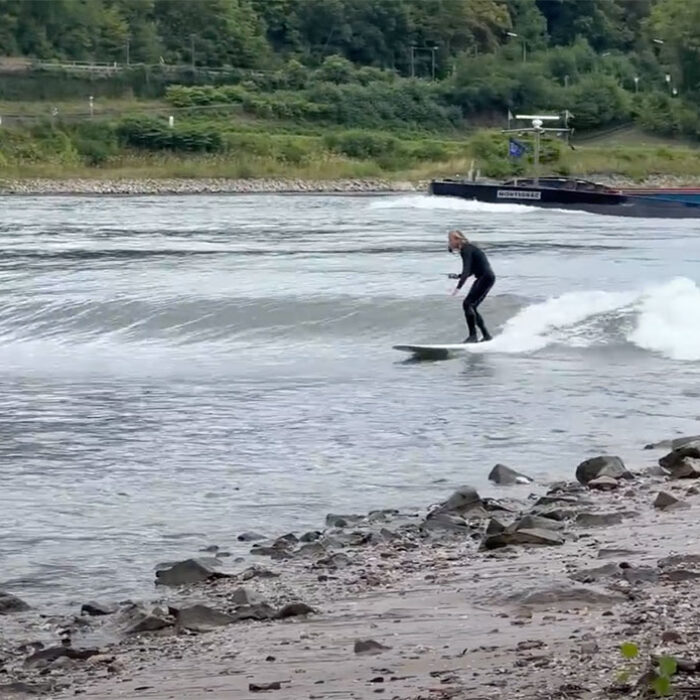 Ben Gravy surfing wave in Germany