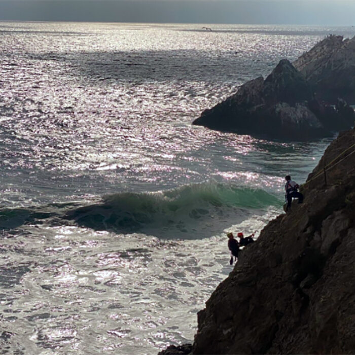 san francisco fire dept rappels down cliff to rescue surfer