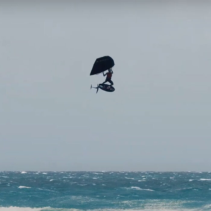Kai Lenny on hydrofoil with wing
