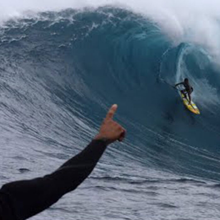 Kai Lenny stand up paddle boarding at Jaws