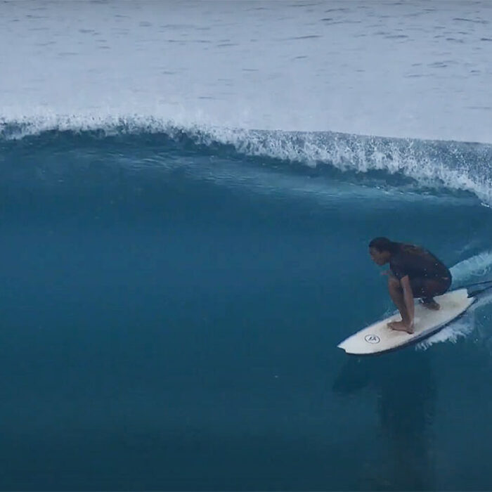 Derrick Disney surfing