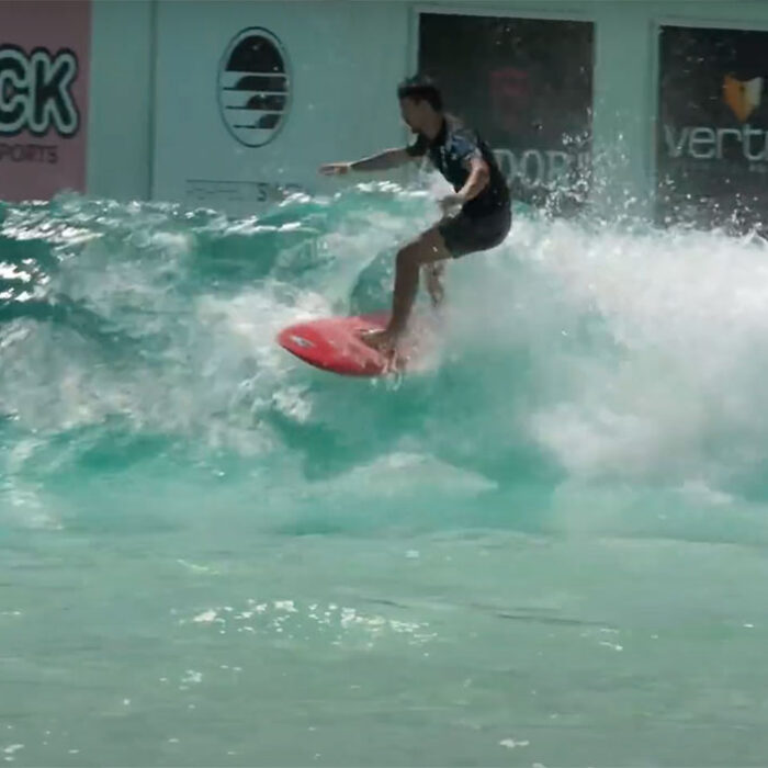 Max Holloway surfing in Japan