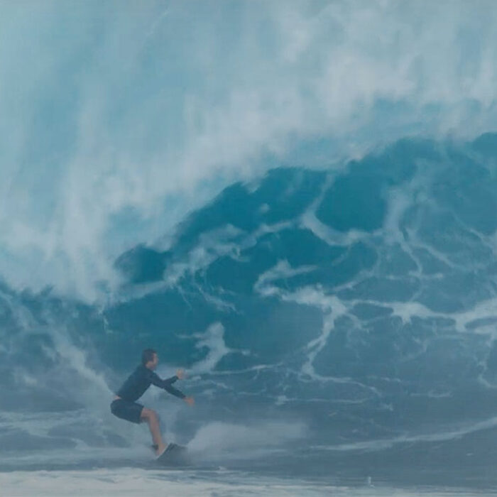 surfers wiping out at Pipeline