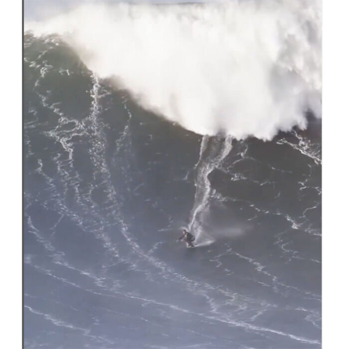 Lucas Fink on skimboard at Nazare