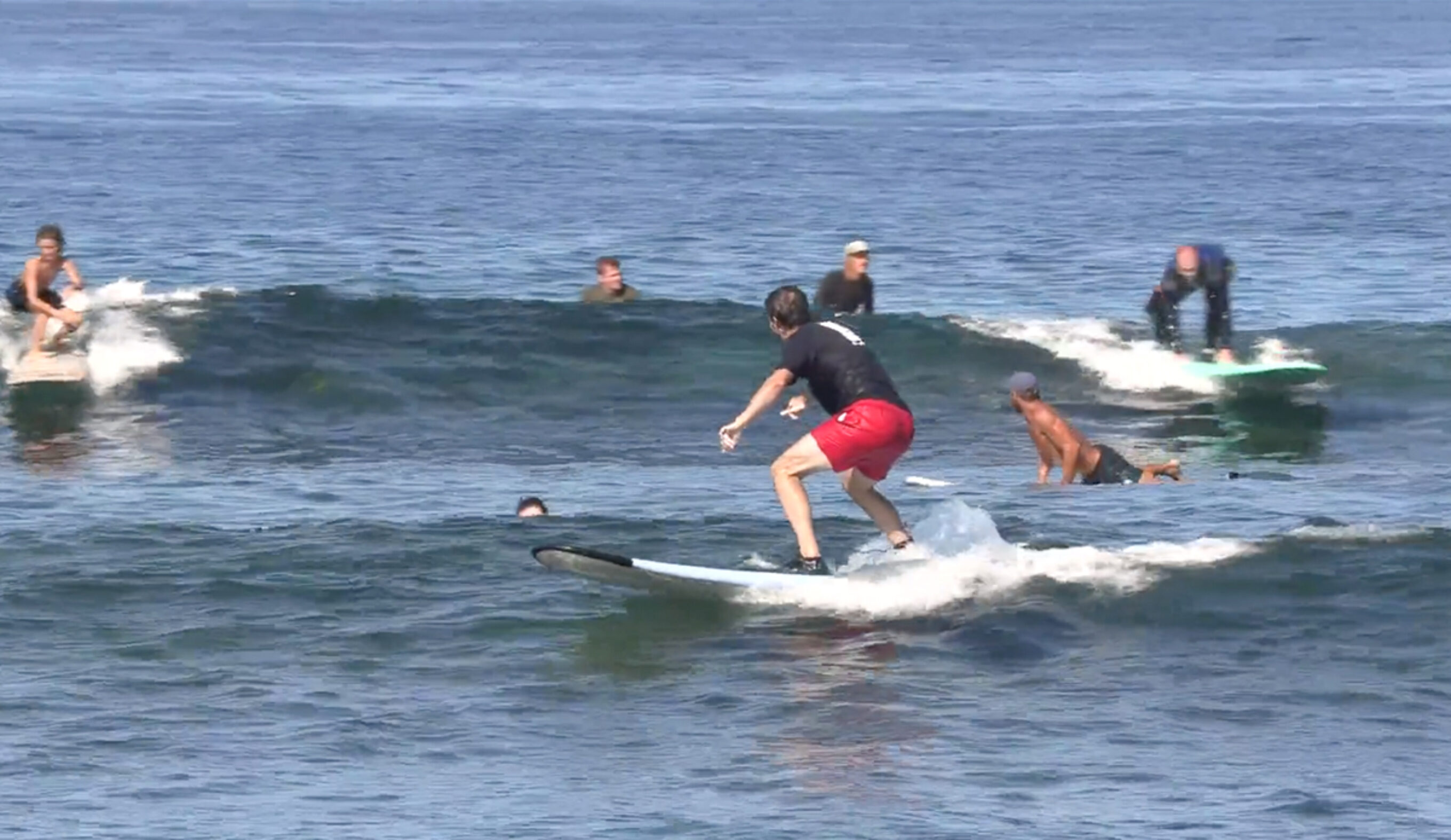 A surf school in Kahaluu Bay. Photo: Hawaii DLNR // Instagram