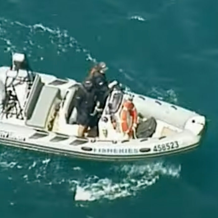 Police search for the remains of a man killed by a shark in Streaky bay. Photo: 9 News // YouTube