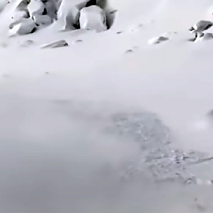 Watch, and Analyze, as This Snowboarder Nearly Gets Taken Out by a Hefty Avalanche