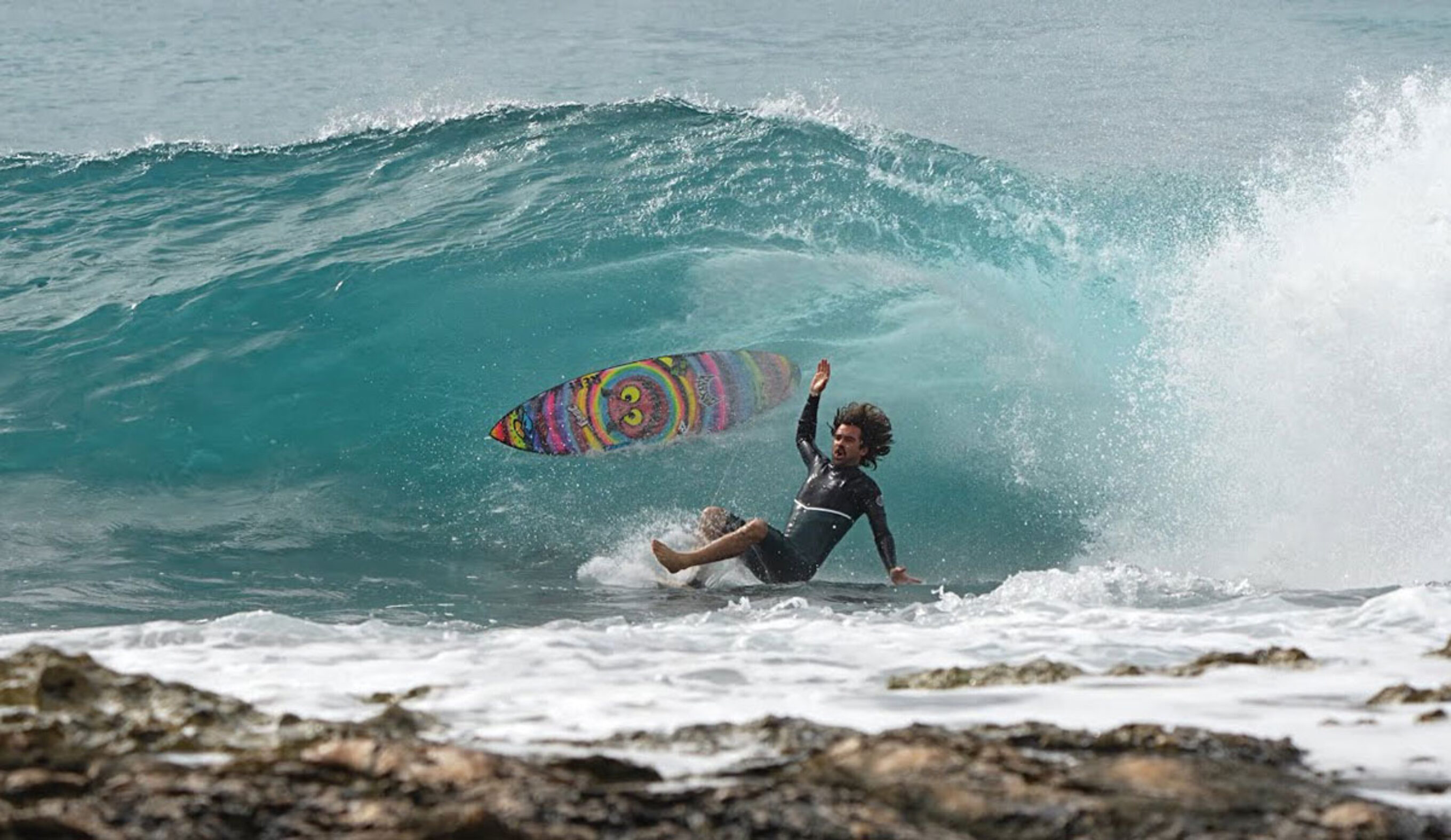 Mason Ho surfing
