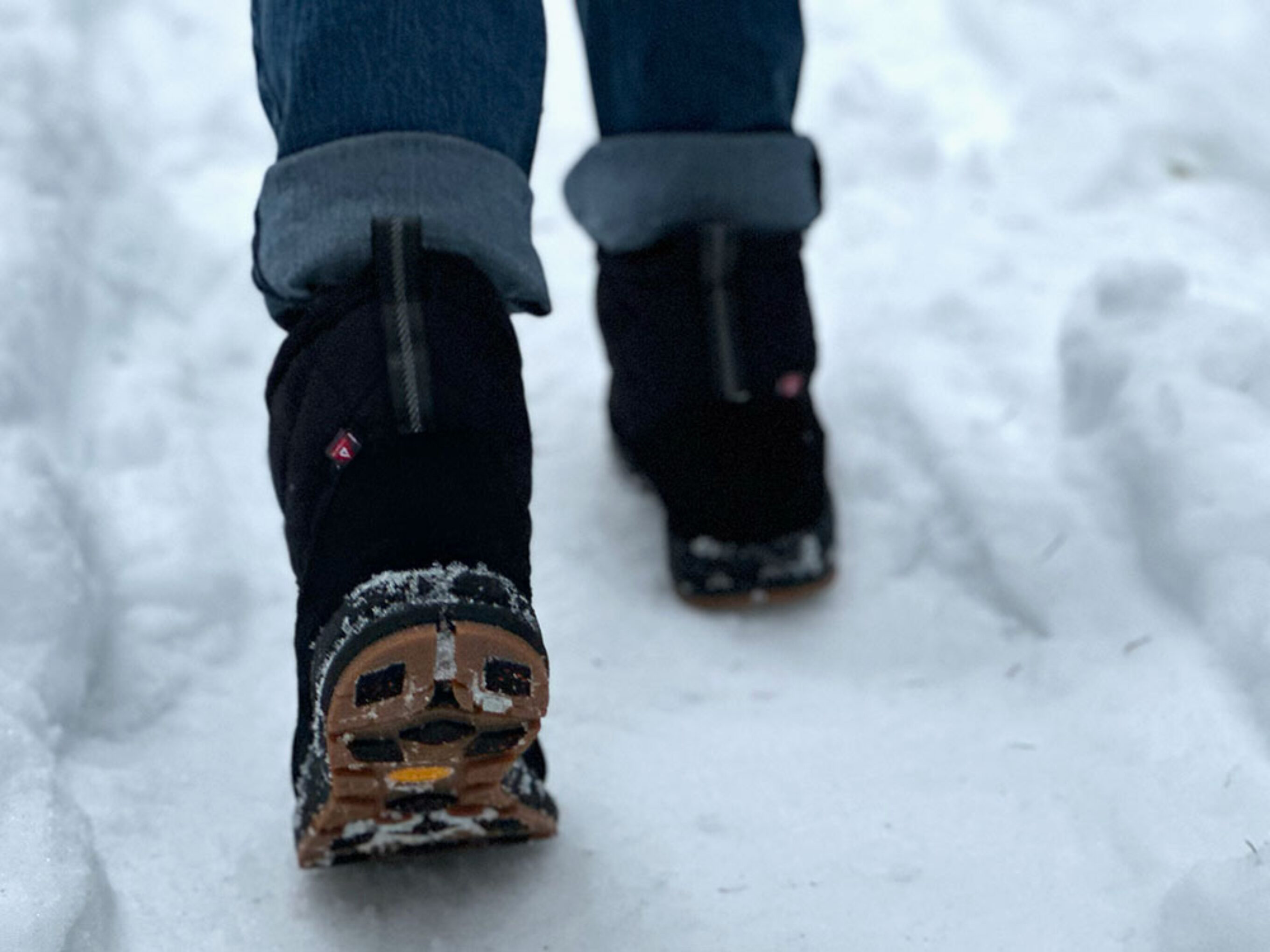 the underside of the Danner Cloud Cap boots on snow