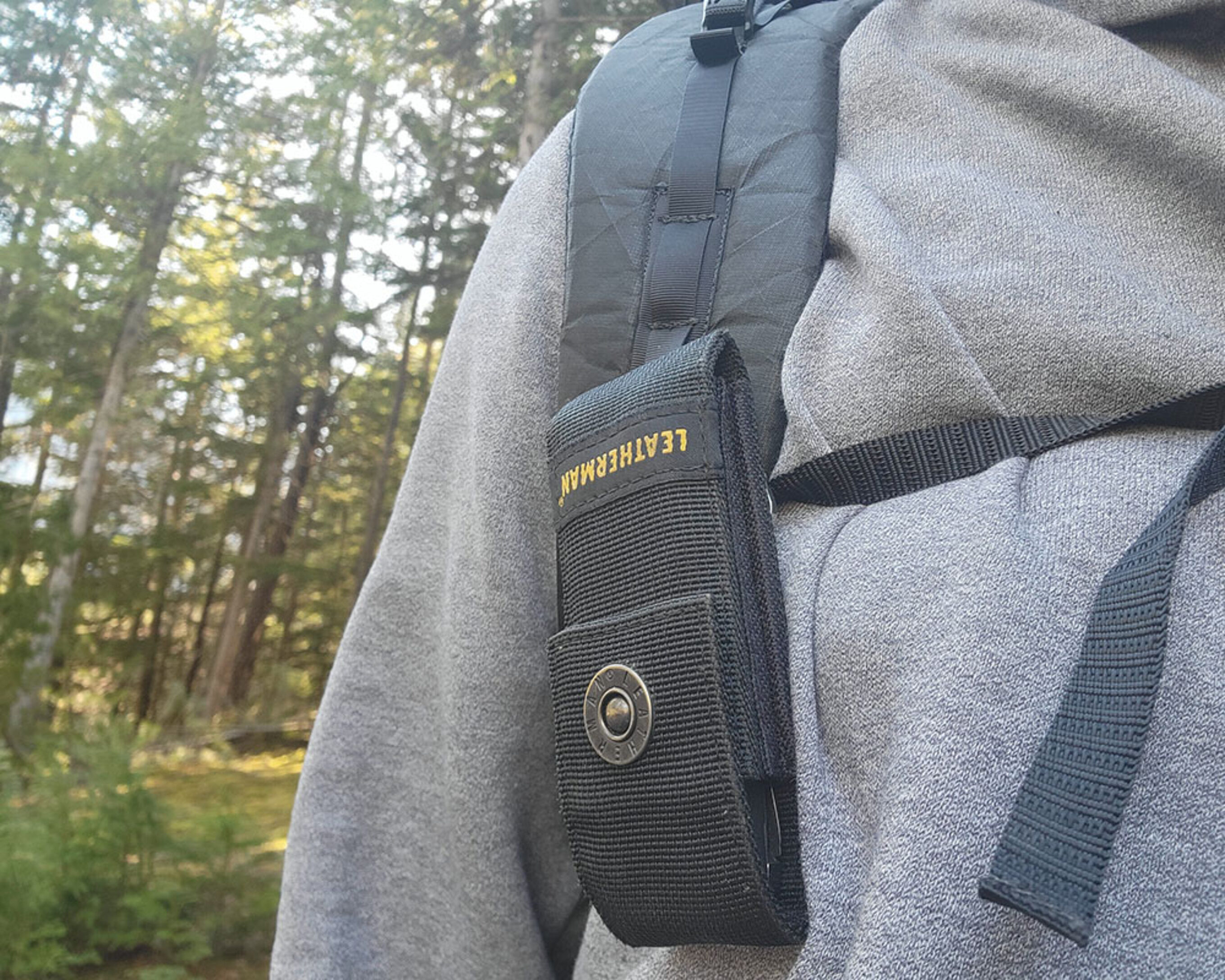 a leatherman multitool on the gear loop of the zpacks arc haul ultra backpack