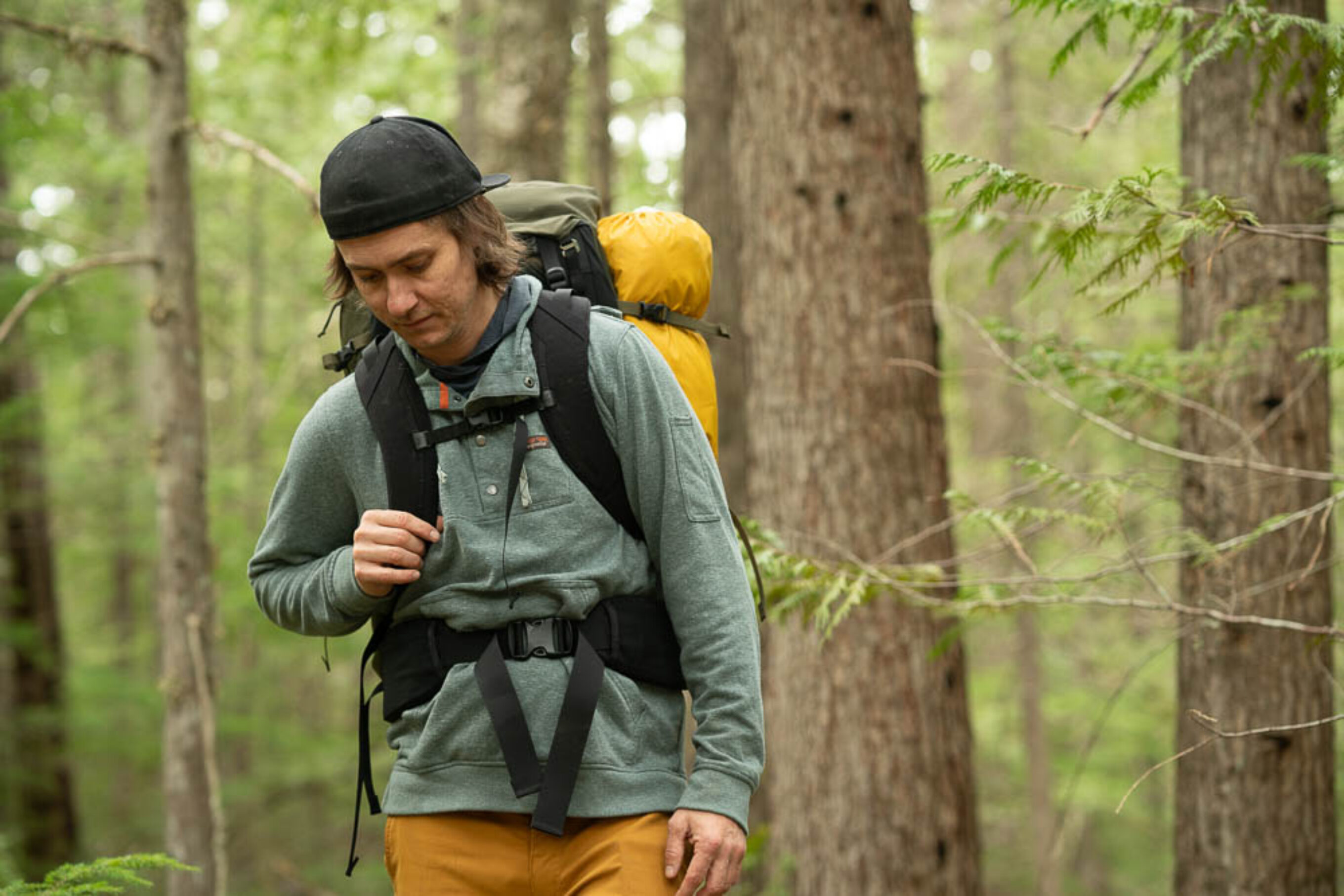 Steve andrews, gear tester, testing backpacks in the forest