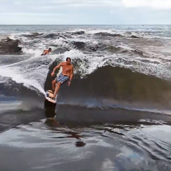 Jamie O'Brien surfing Waimea River wave