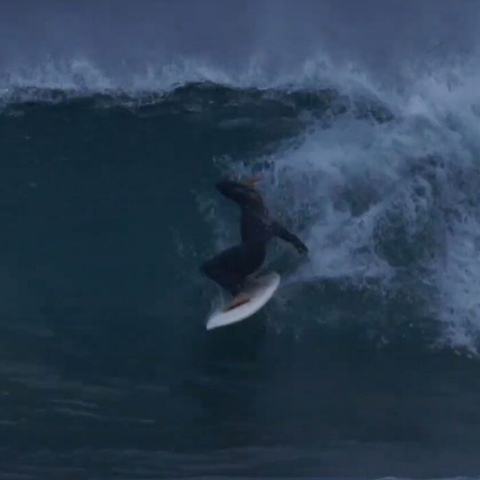 Tahlija Redgard surfing finless