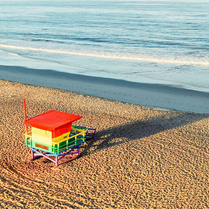 A number of L.A. county lifeguard towers fly pride flags in support of LGBTQ constituents. Photo: Jeffrey Clayton // Unsplash