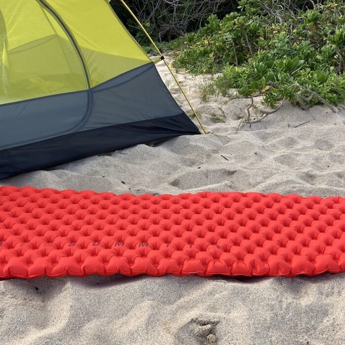 sea to summit ether sleeping pad in front of a tent on the beach