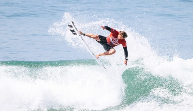 Alan Cleland surfing in Heat 2 of the US Open of Surfing Quarterfinals. Photo: Emma Sharon // WSL