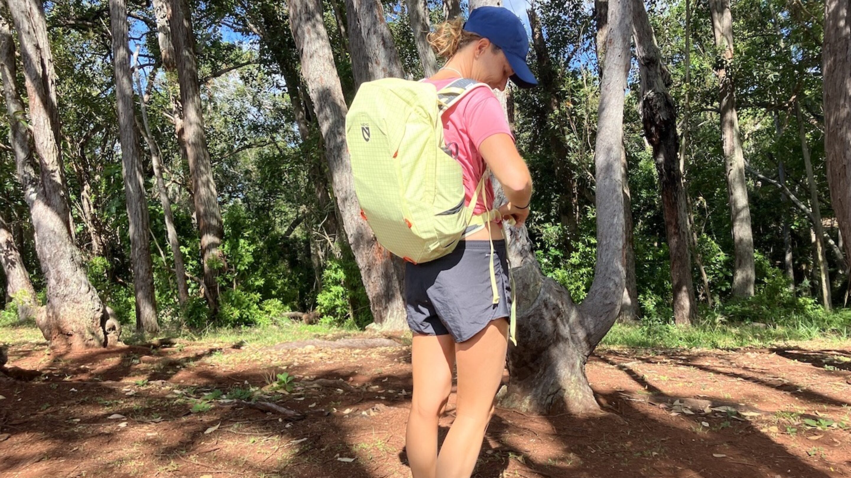 a woman wearing a hiking backpack