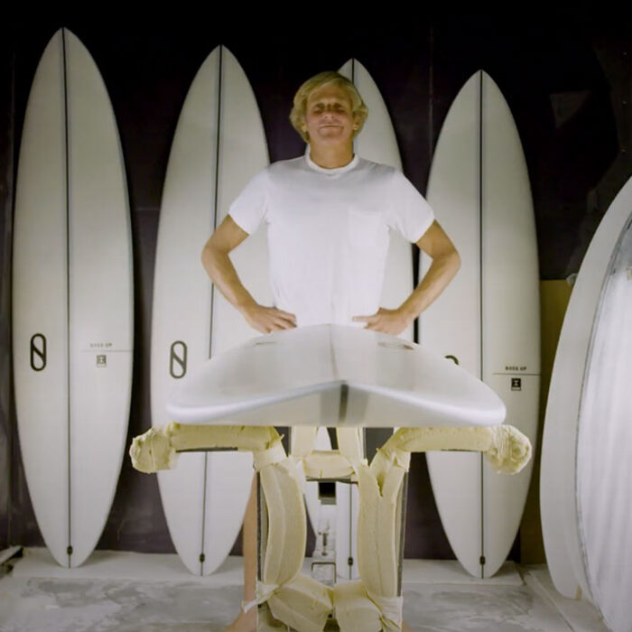 Dann Mann with Boss Up surfboard