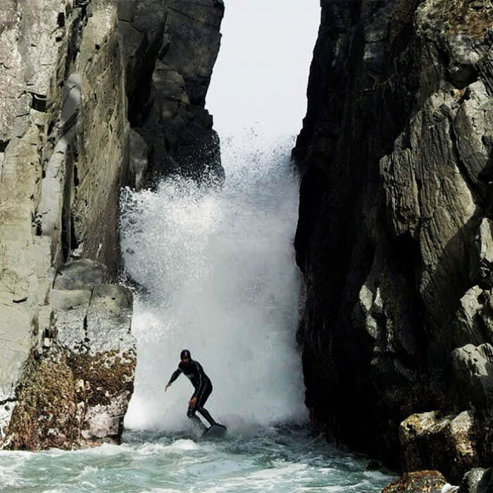 Dylan Graves surfing