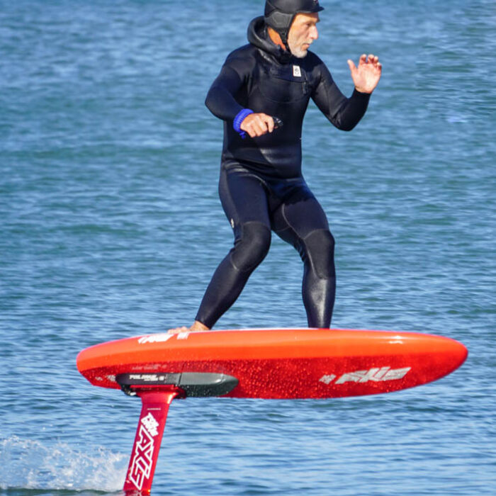 Bowen riding the Axis Foil Drive board with Foil Drive
